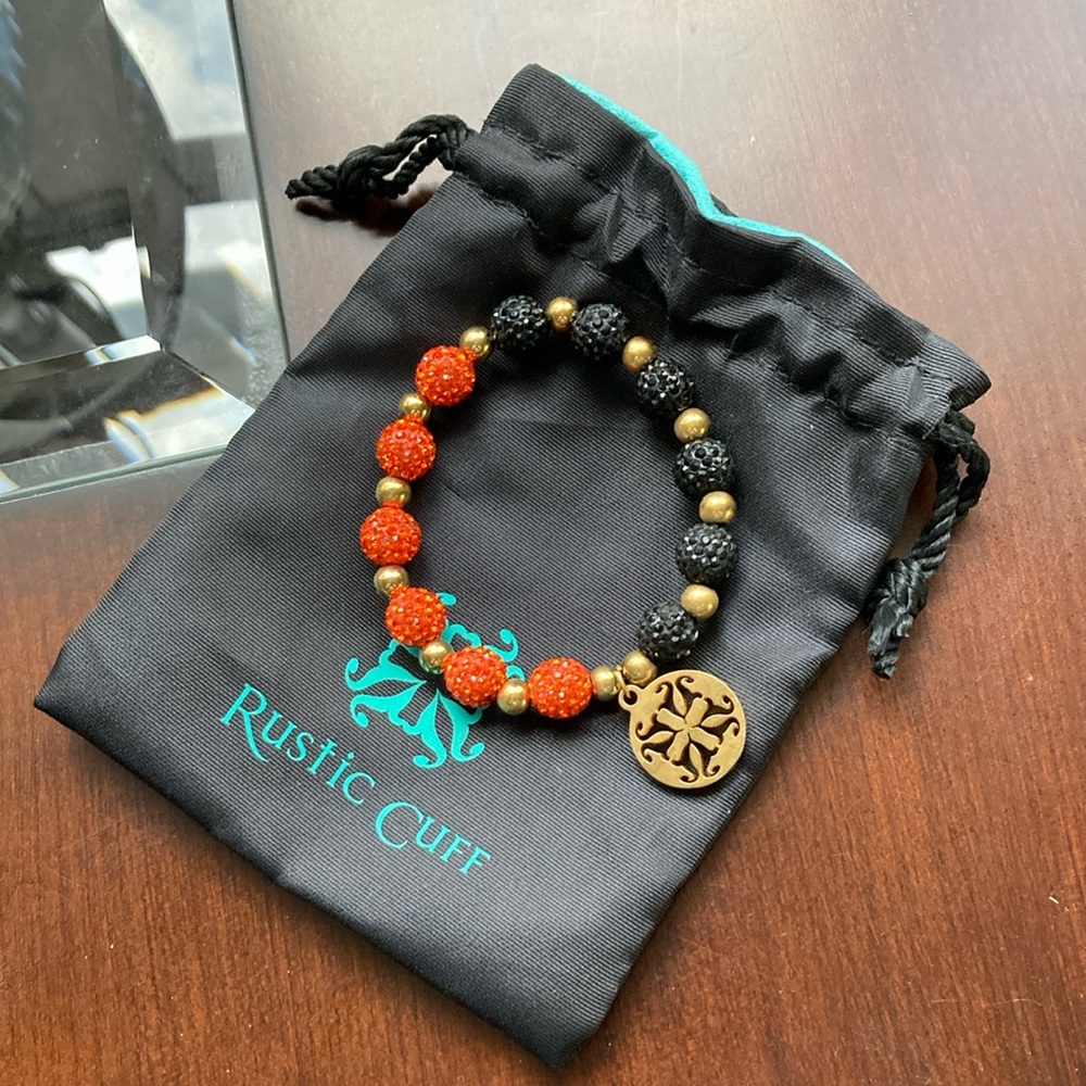 EUC orange & black Rustic Cuff bracelet w/ RC dust bag